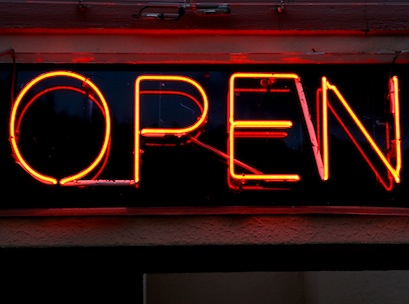 bright red and orange open sign