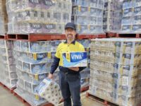 A man holds Viva paper towels used in Kimberly-Clark and Woolworths packaging trial