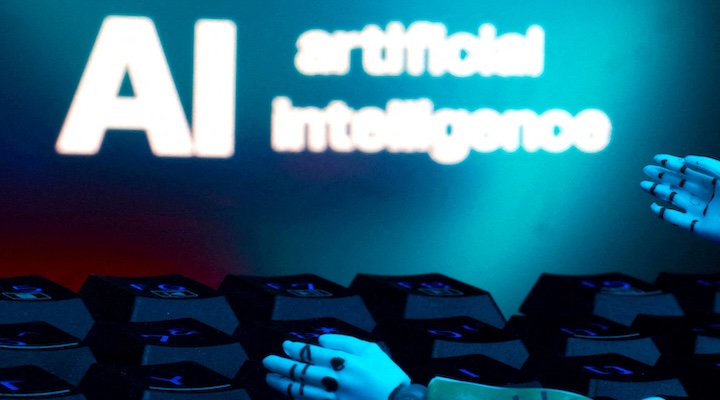 AI, a keyboard, and robot hands are seen in this illustration.