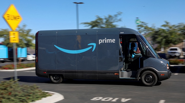 An electric Amazon truck purchased is pictured working on delivery