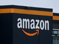 The logo of Amazon at the company's logistics center