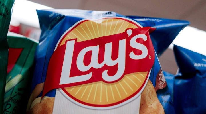 Lay’s products sit on shelves in a supermarket in a CVS store in New York City