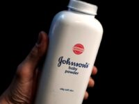 A bottle of Johnson and Johnson Baby Powder is seen in a photo illustration