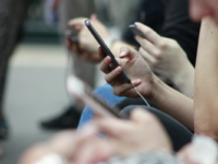 people on their phones